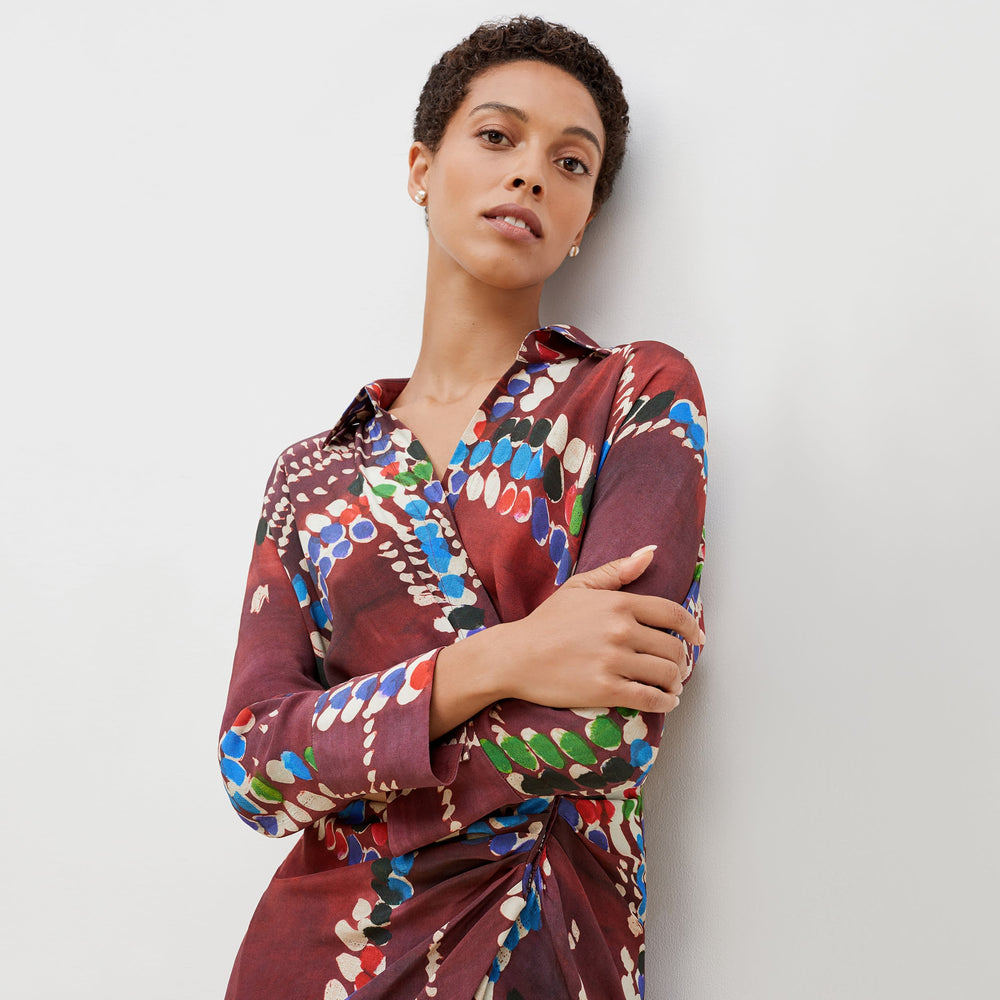 Detail image of a woman standing wearing the june dress dash plaid in multicolor