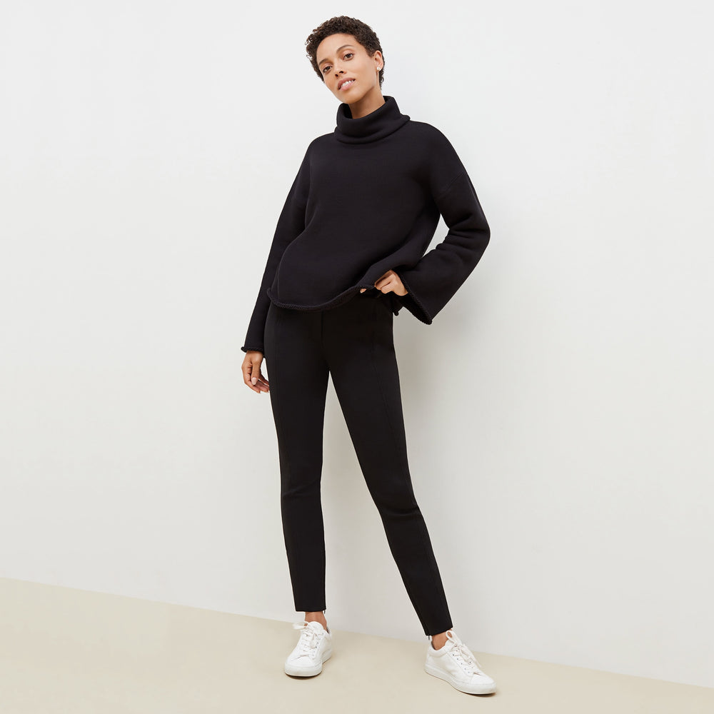 Front image of a woman standing wearing the Sharon Top—Plush Terry in Black