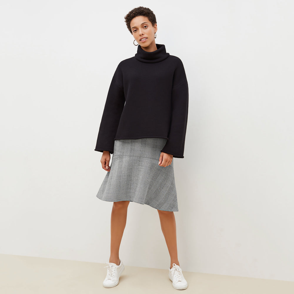 Front image of a woman standing wearing the Sharon Top—Plush Terry in Black