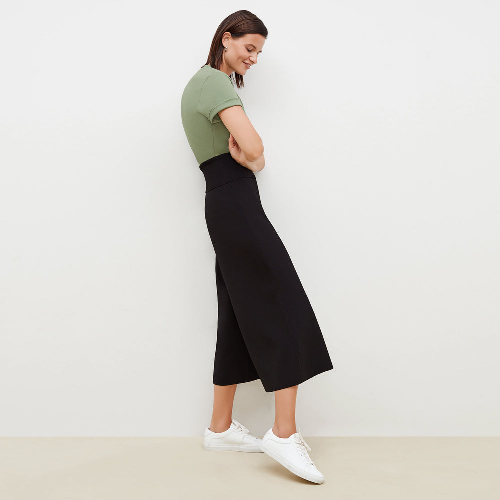 Side image of a woman standing wearing the Rogala Pant—Jardigan Knit in Black