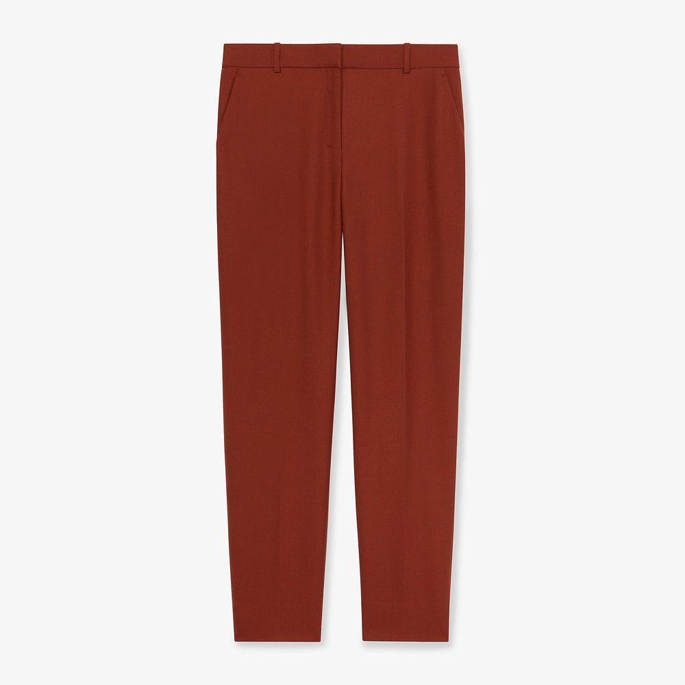 Packshot image of the mejia pant in sharkskin in rust