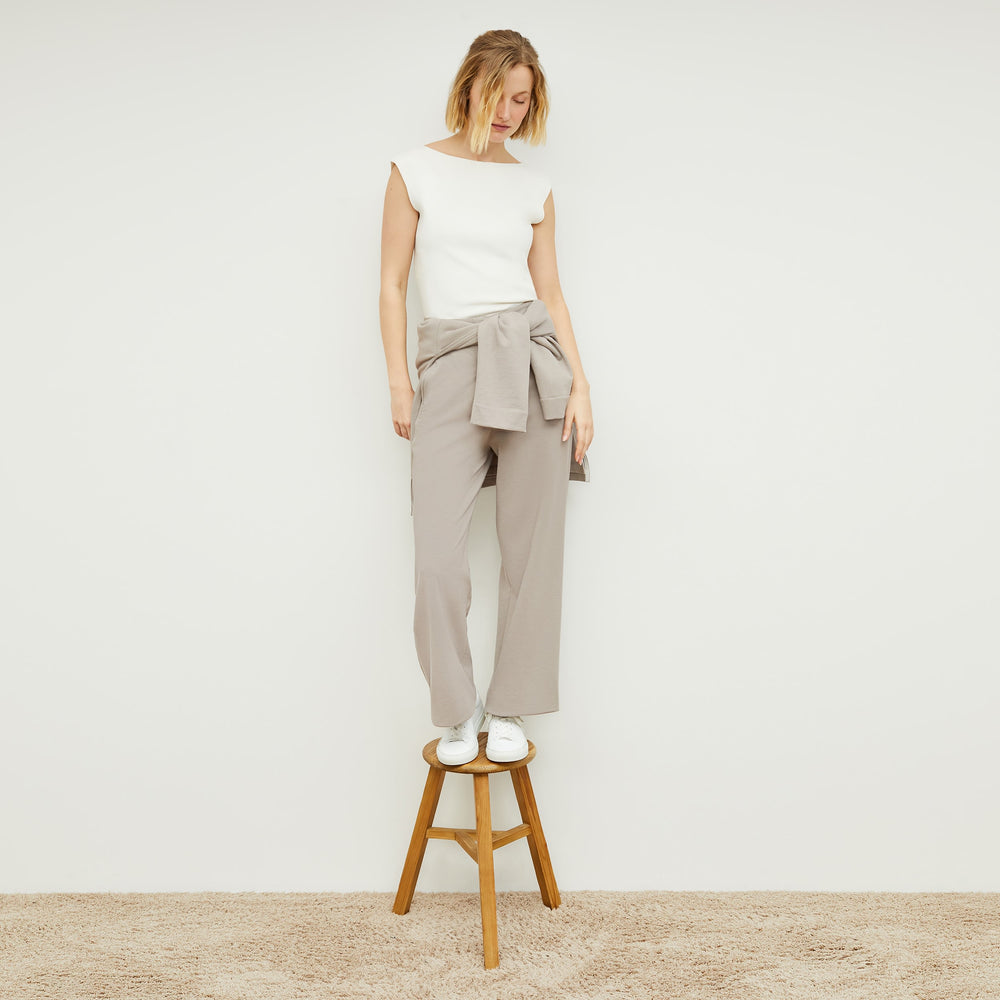 Front image of a woman standing wearing the Georgina Lounger—Fine Terry in Smoky Taupe