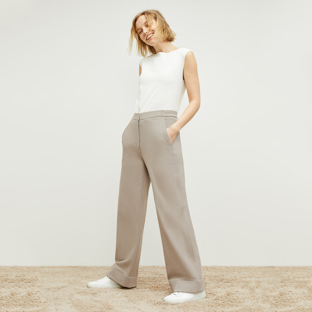 Front image of a woman standing wearing the Georgina Lounger—Fine Terry in Smoky Taupe