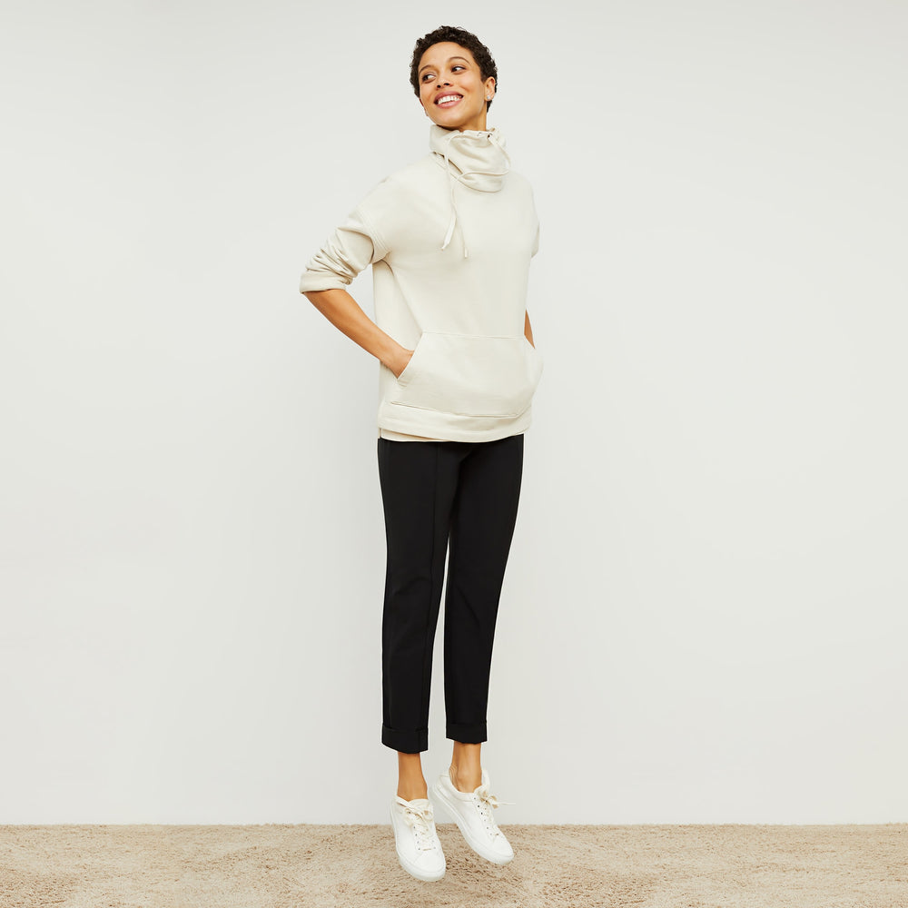 Front image of a woman standing wearing the Harris Sweatshirt—Fine Terry in Pearl