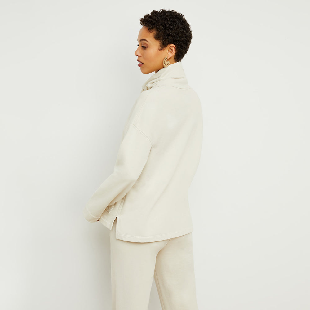 Back image of a woman standing wearing the Harris Sweatshirt—Fine Terry in Pearl