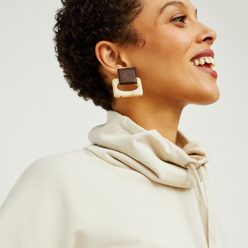 Detail image of a woman standing wearing the Harris Sweatshirt—Fine Terry in Pearl