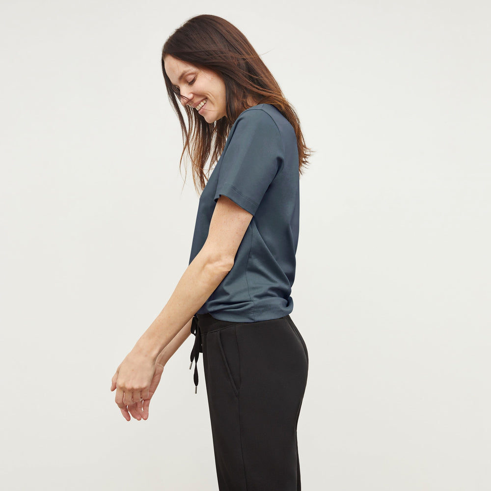 woman wearing the leslie t-shirt in deep sea