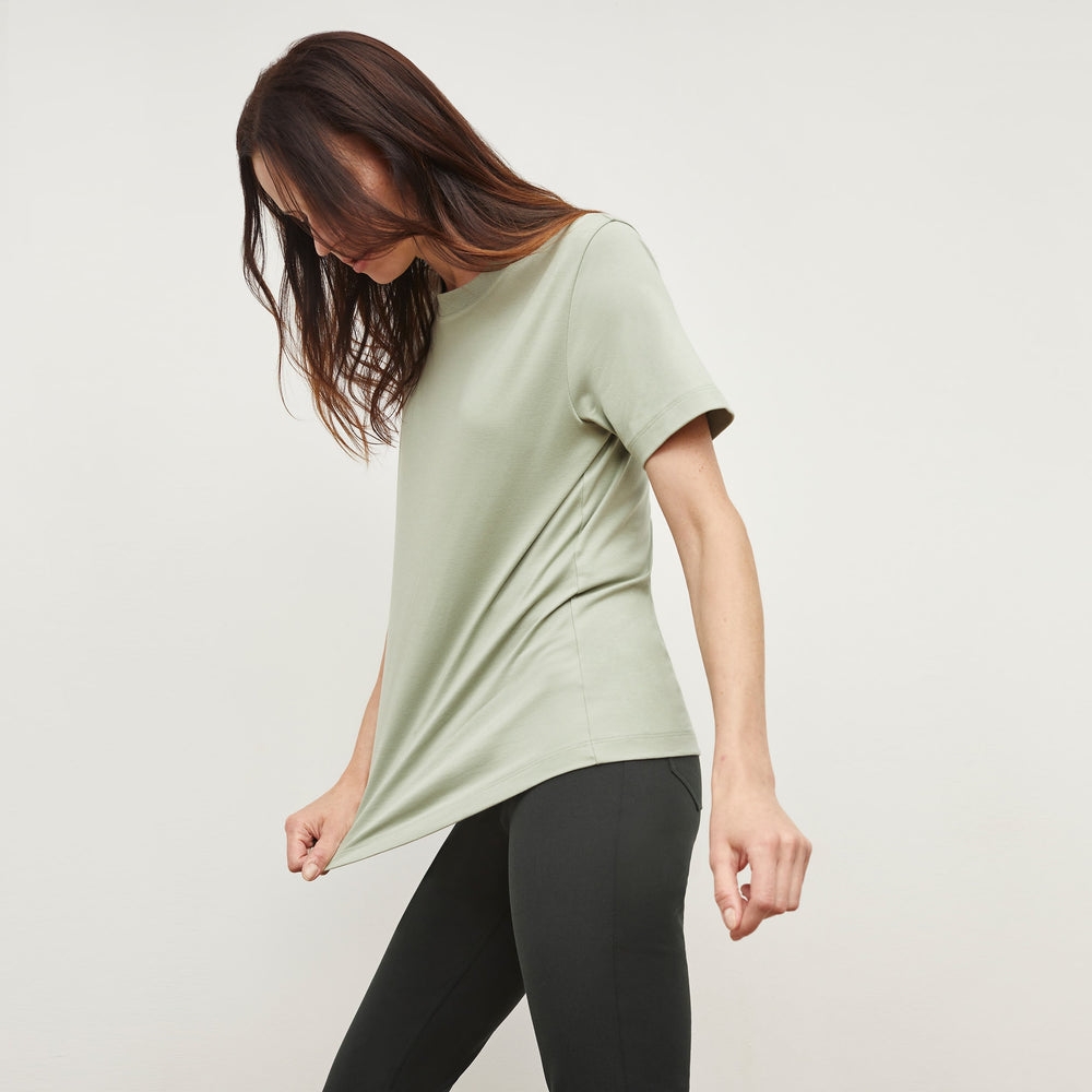 woman wearing the leslie t in minty green