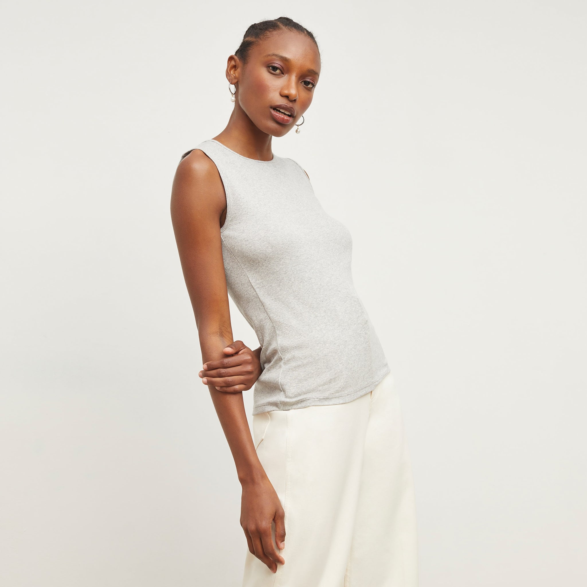 front image of woman wearing the paige tank in gray melange