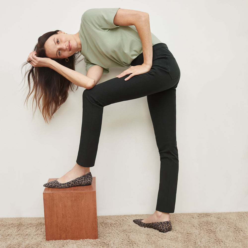 Side image of a woman standing wearing the Hockley Jean in Hemlock