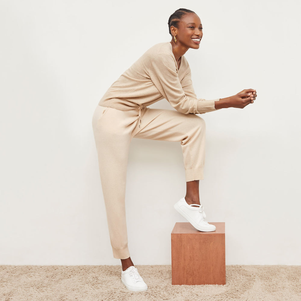 Front image of a woman standing wearing the Keely Jogger—Cashmere in Turbinado