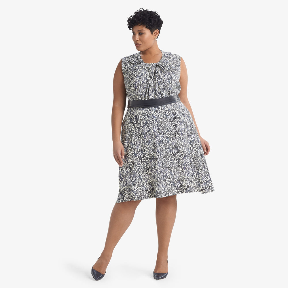 Front image of a woman standing wearing the Hopson skirt Ivy Print in galaxy blue