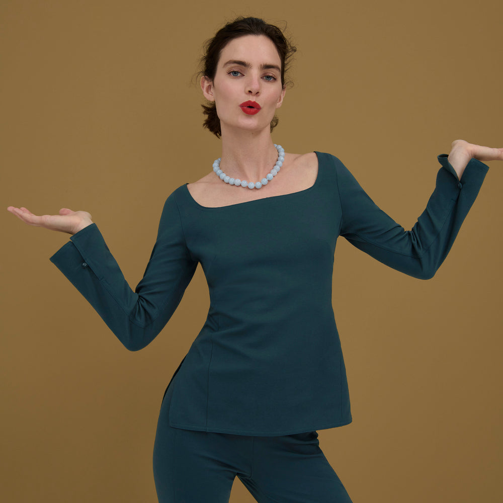 Front image of a woman wearing the Jace Top in Deep Sea