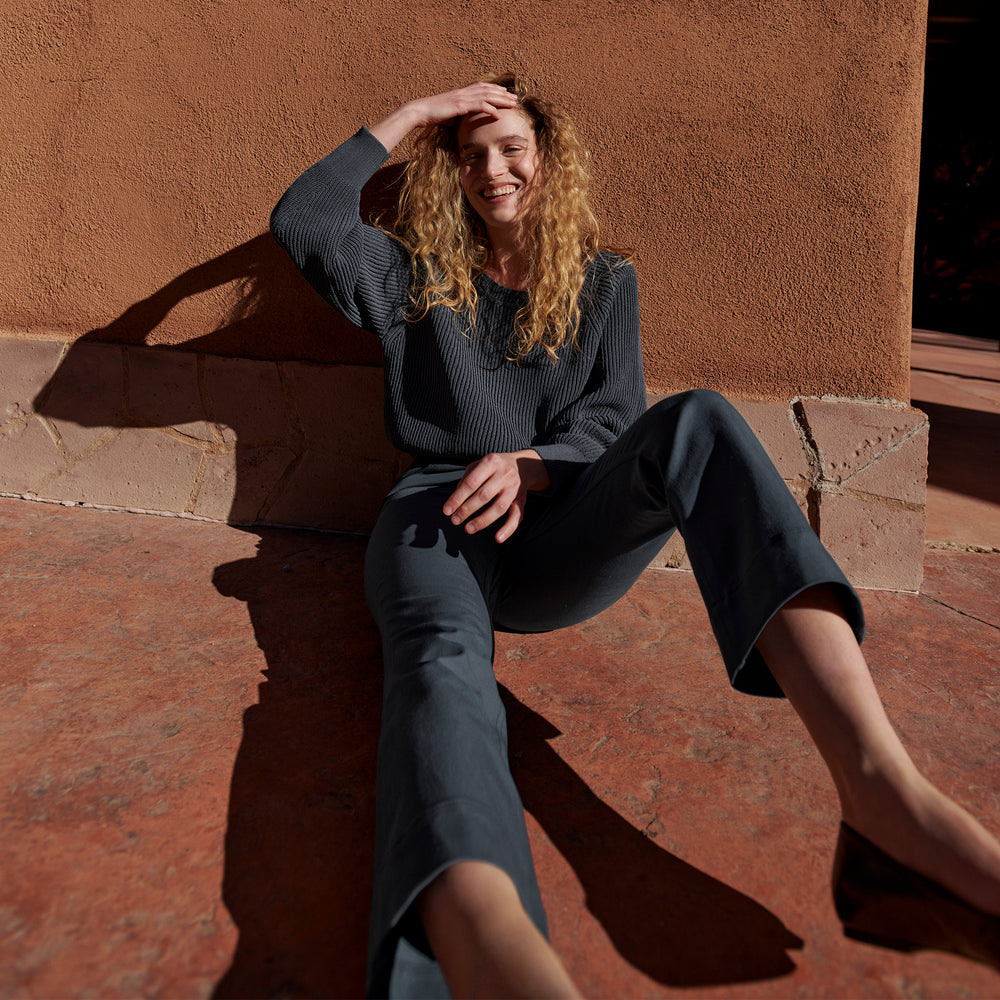 Front image of a woman wearing the Jo Sweater - Sleek Cotton in Dusty Indigo