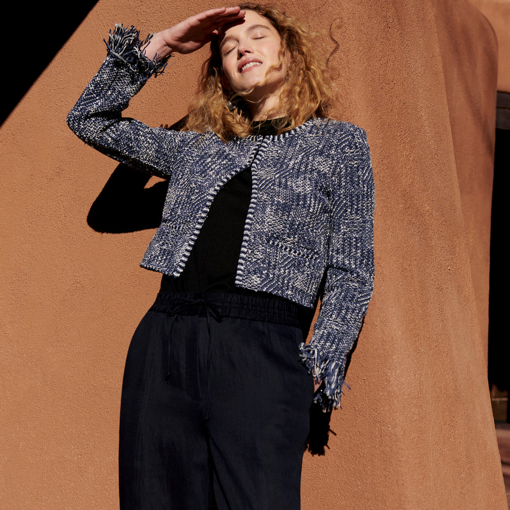 Front image of a woman wearing the Lilia Jacket - Interweave in Navy / Ivory