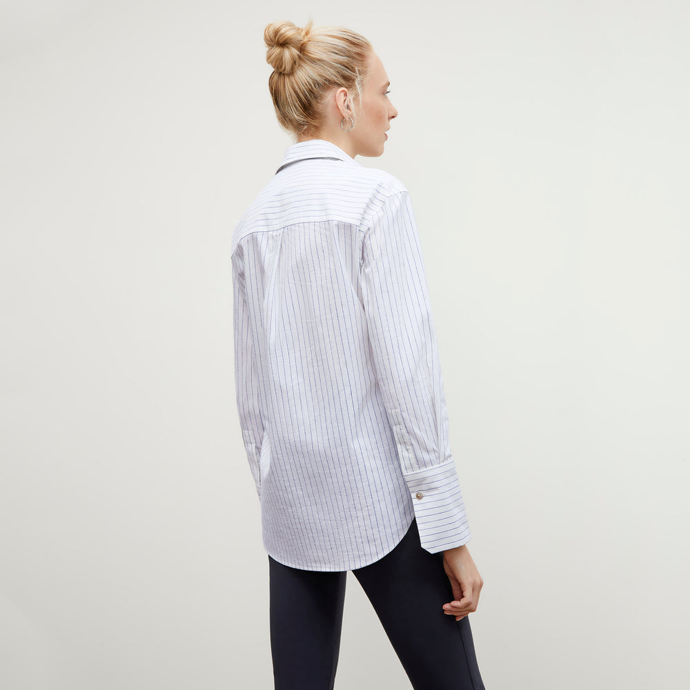 Back image of a woman wearing the Mila Button Down - Poplin Stripe in Blue / Ivory