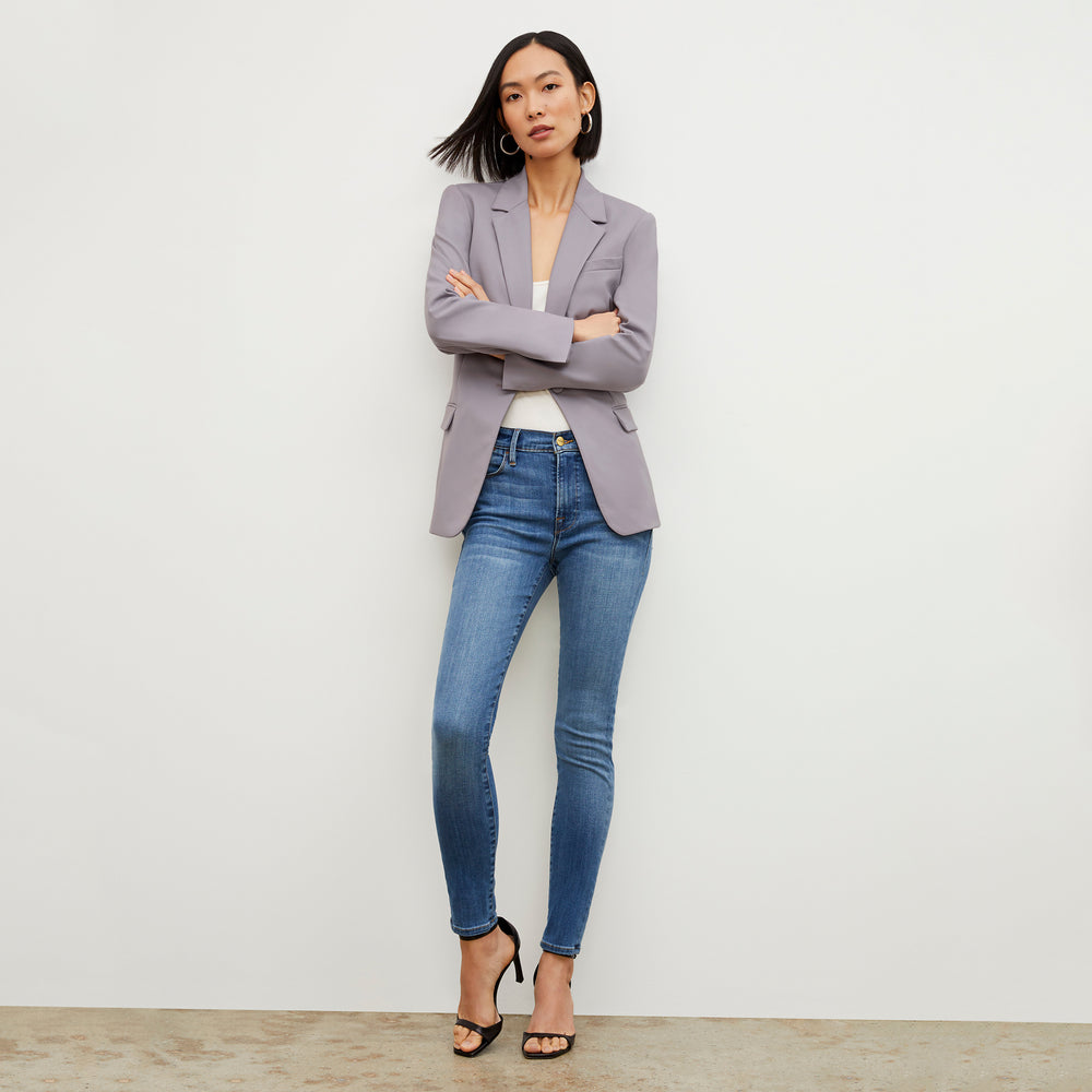 Front image of a woman wearing the FRAME Denim Le High Skinny Jean in Poe