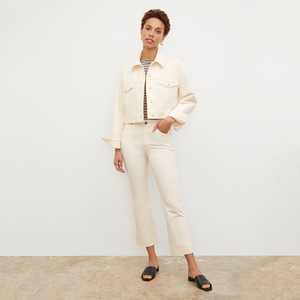 Front image of a woman wearing the Archie Jean in Tusk