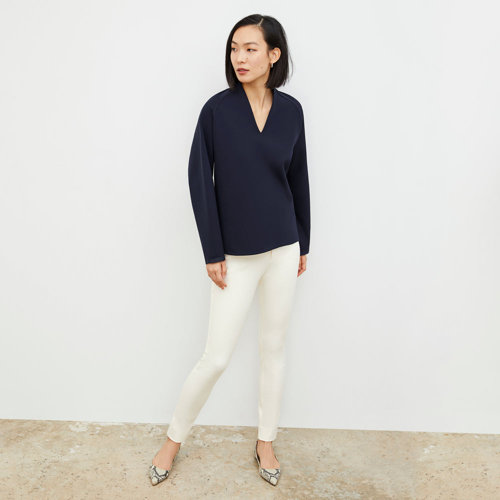 Front image of a woman wearing the Shawn Sweatshirt - Light Scuba in Space Blue