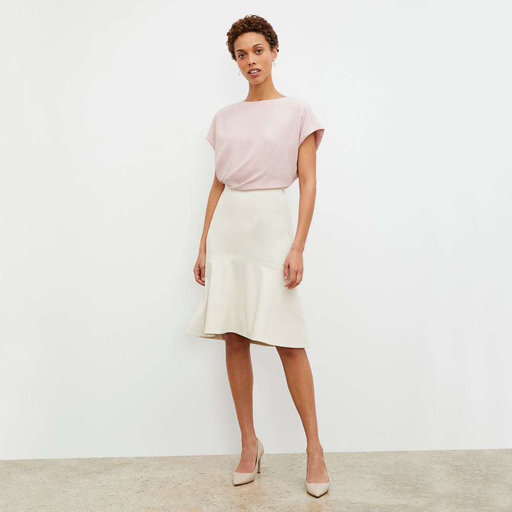 Front image of a woman wearing the Nejvi Top in Blossom