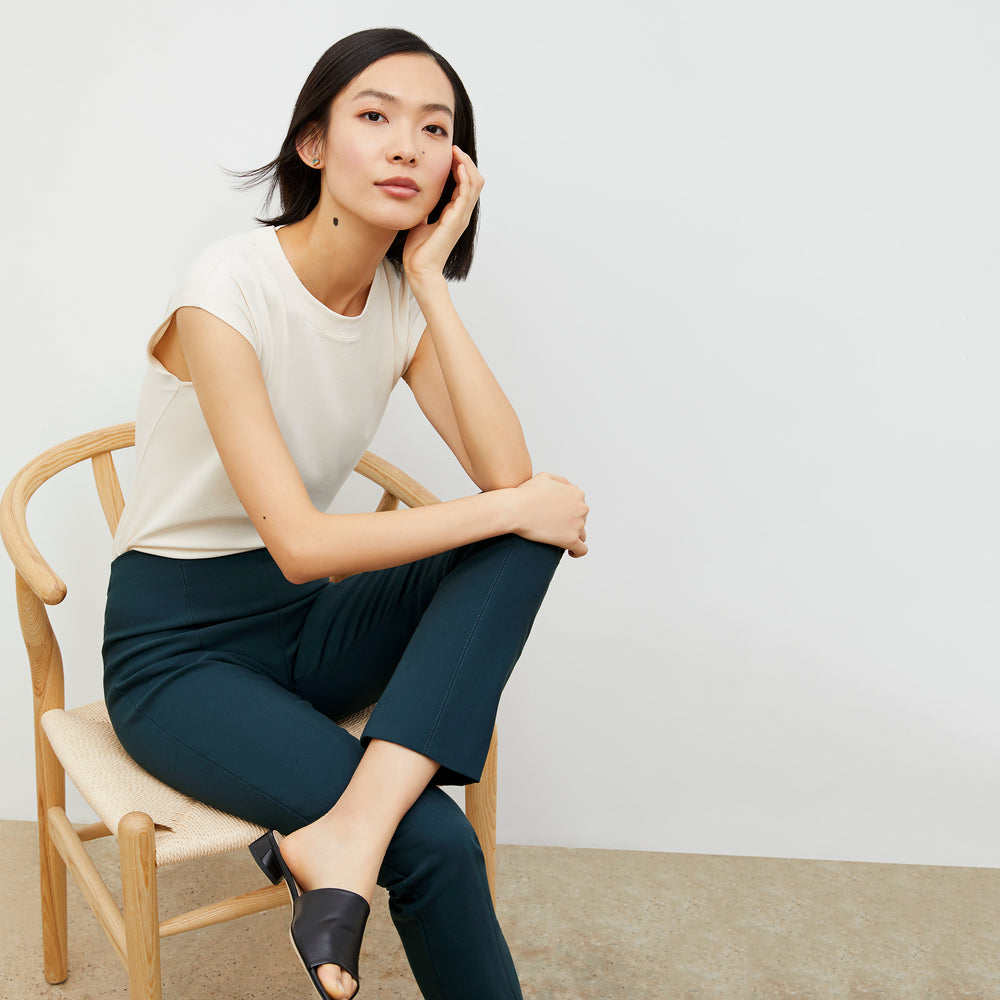 Front image of a woman wearing the Foster Pant - Everstretch  in Deep Sea