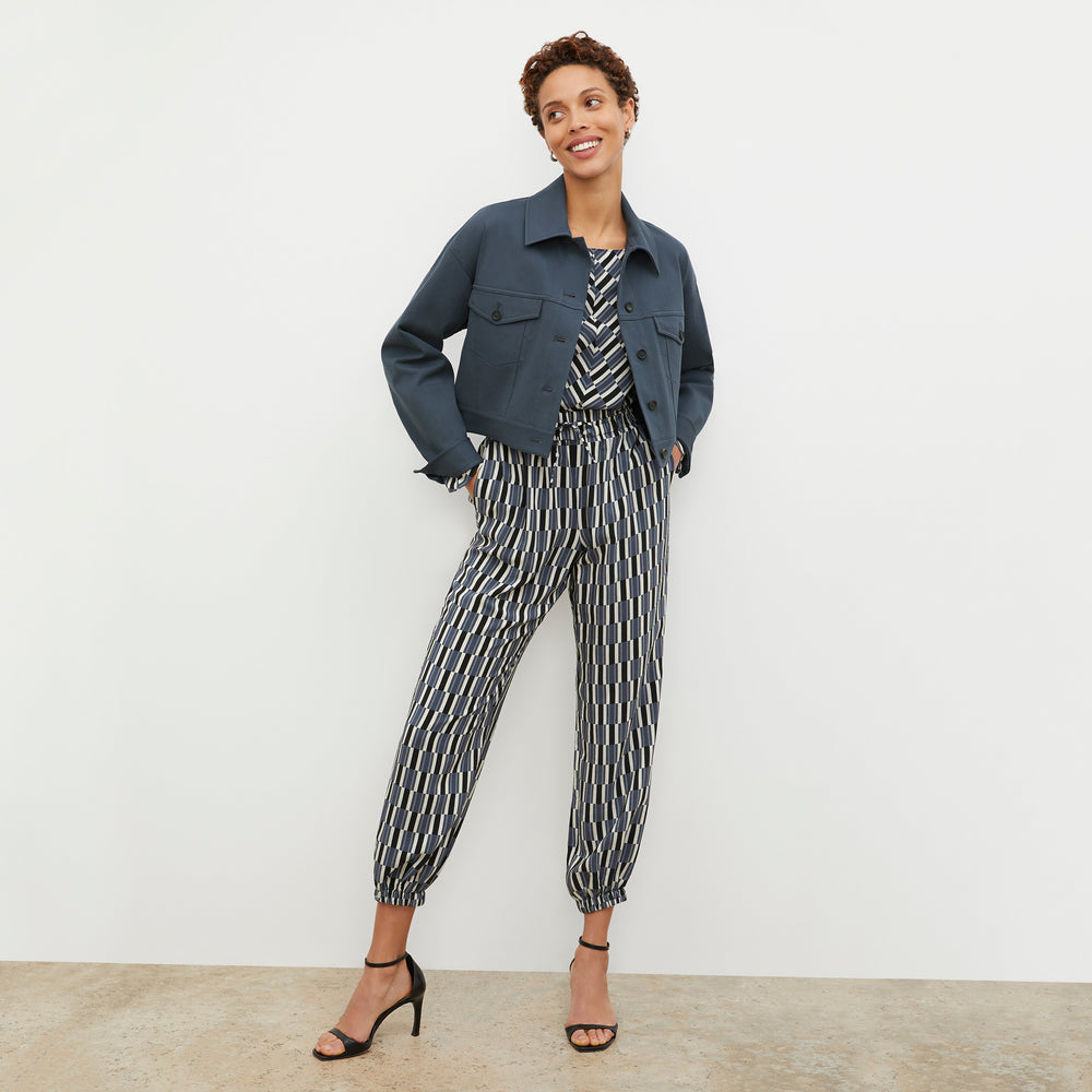 Front image of a woman wearing the Amelia Jogger - Arpeggio Print Washable Silk in Blue / Black