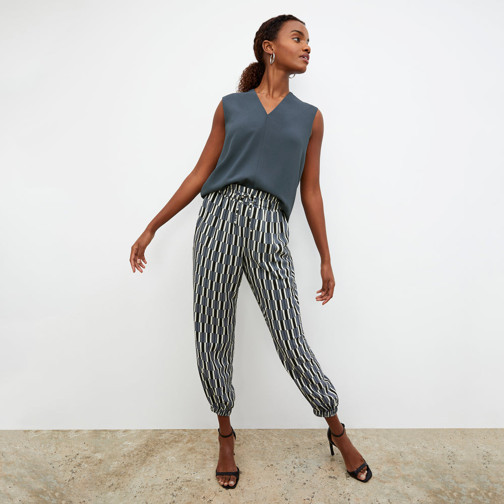 Front image of a woman wearing the Amelia Jogger - Arpeggio Print Washable Silk in Blue / Black