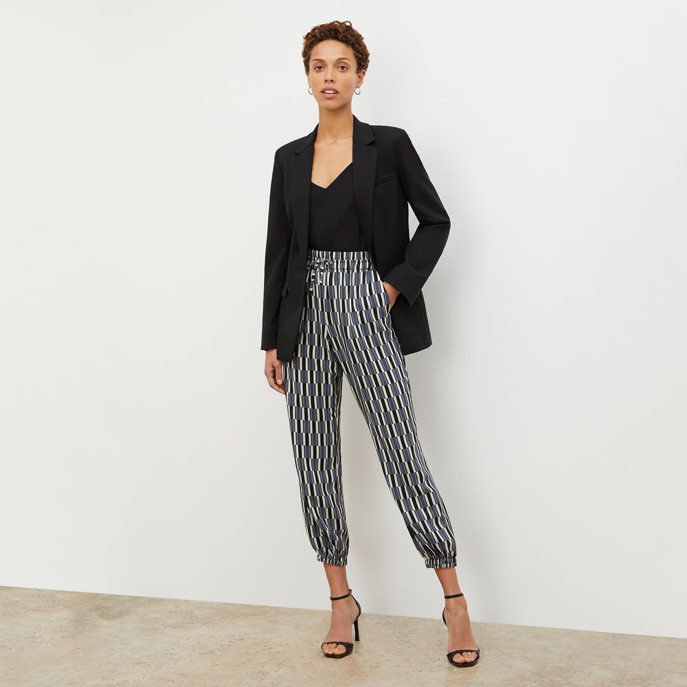 Front image of a woman wearing the Amelia Jogger - Arpeggio Print Washable Silk in Blue / Black