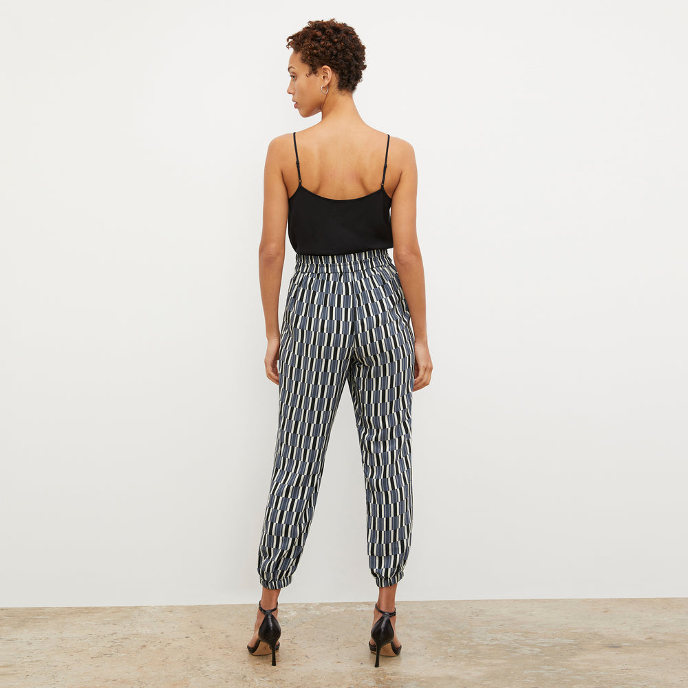 Back image of a woman wearing the Amelia Jogger - Arpeggio Print Washable Silk in Blue / Black