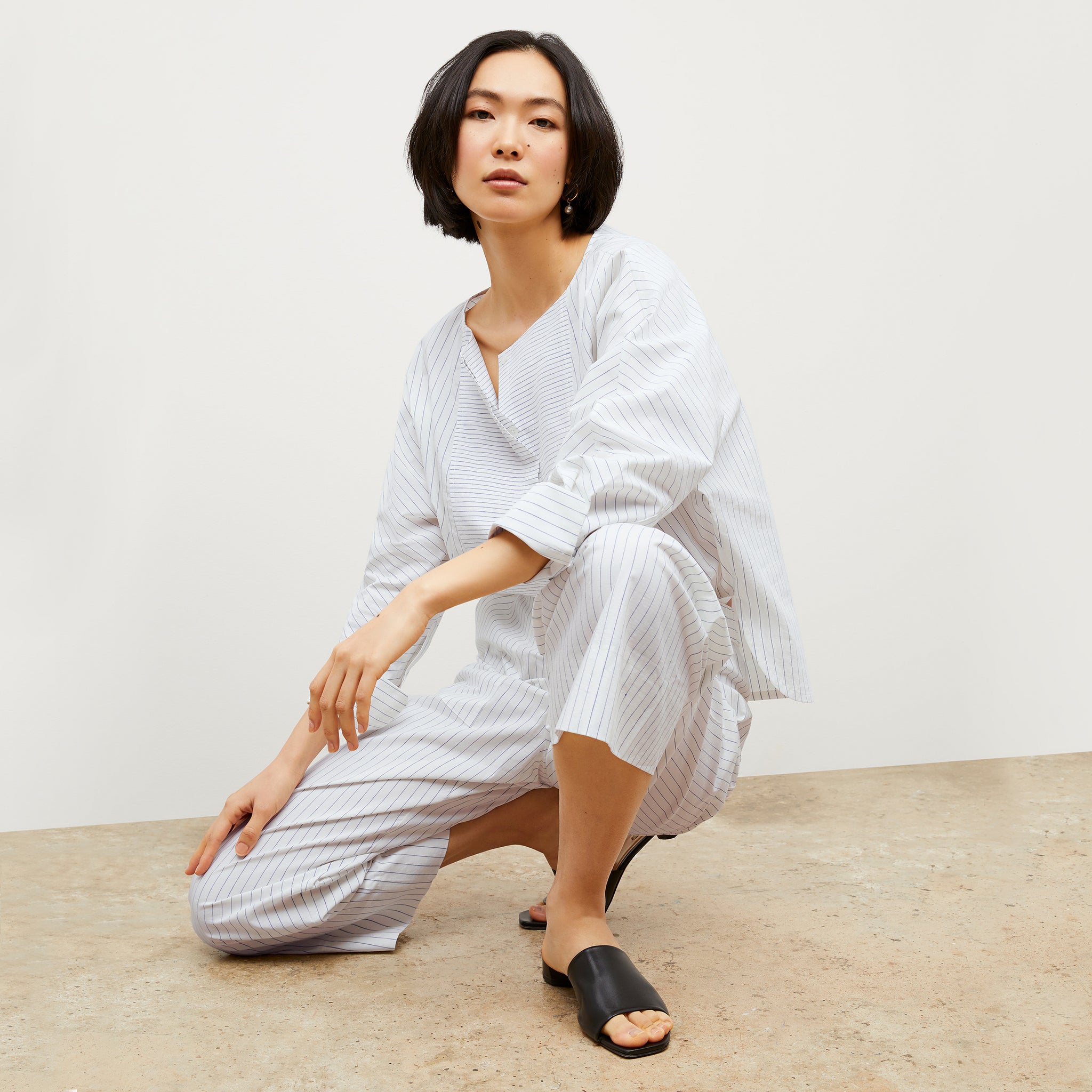 Image of a woman wearing the Madelyn Pant in Blue / Ivory