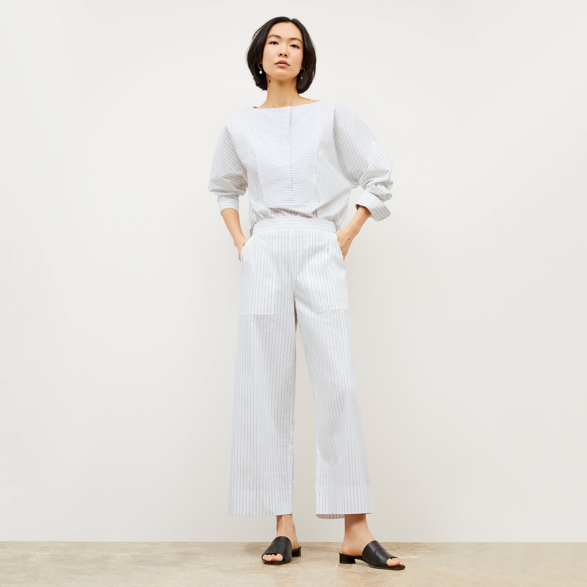 Image of a woman wearing the Madelyn Pant in Blue / Ivory