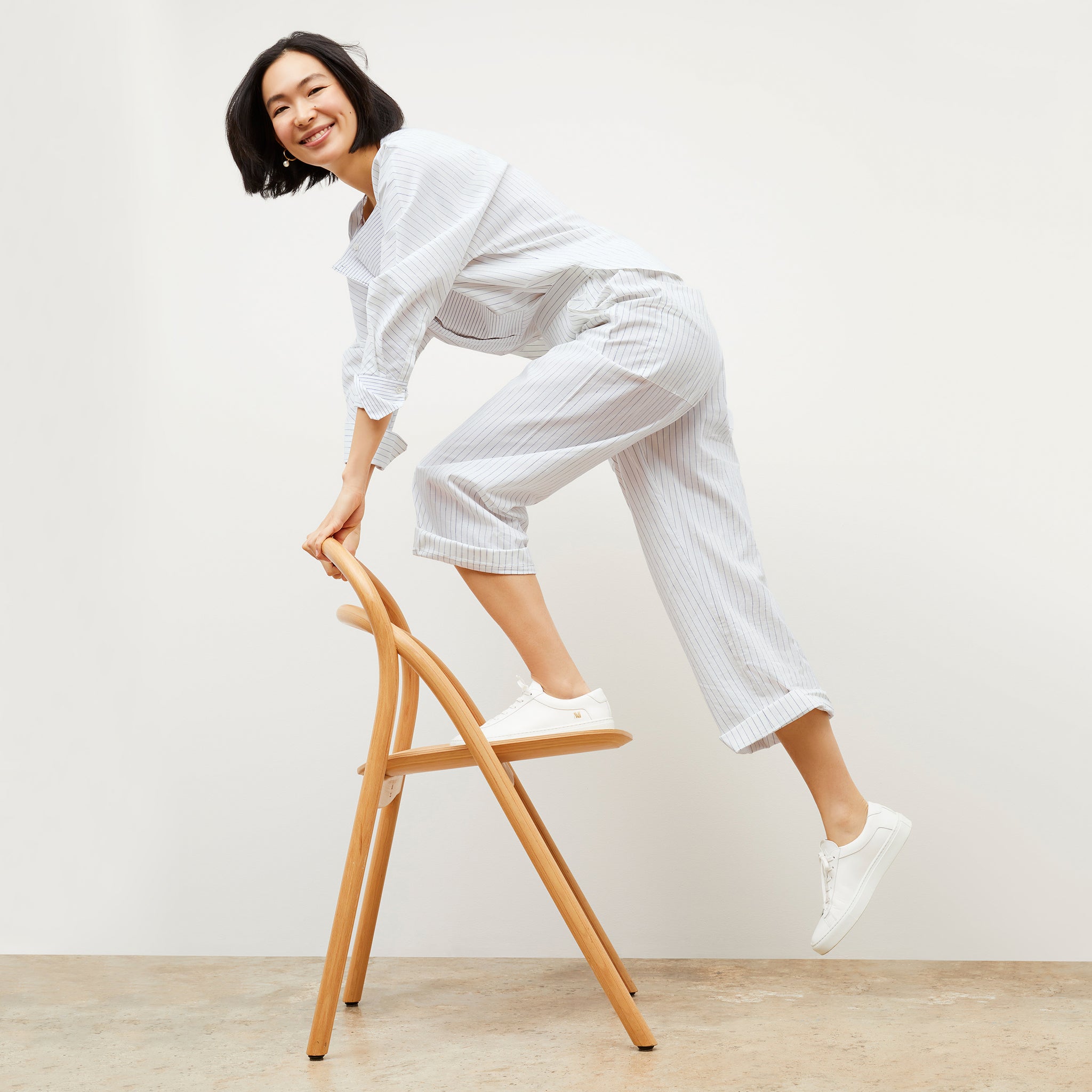 Image of a woman wearing the Madelyn Pant in Blue / Ivory