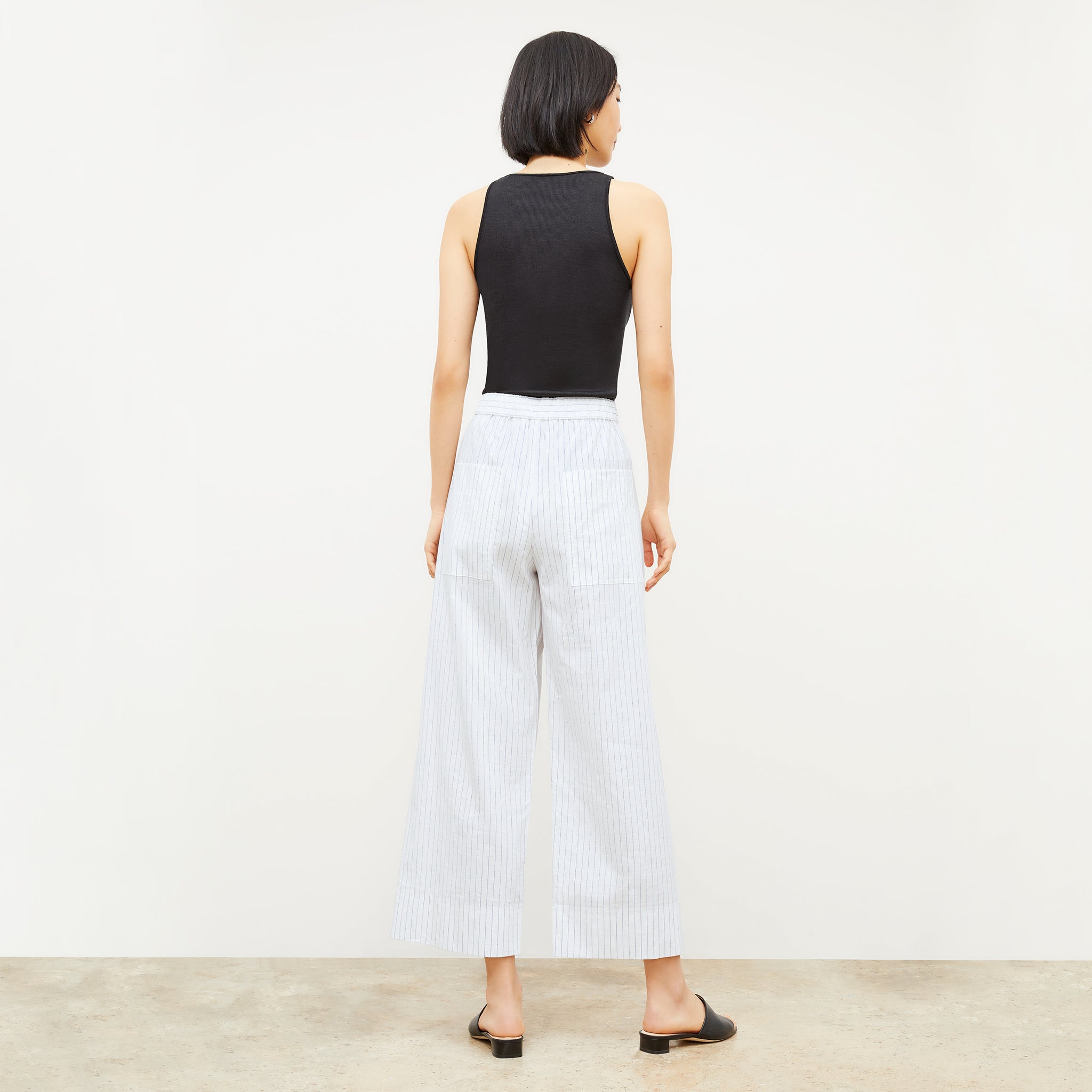 Image of a woman wearing the Madelyn Pant in Blue / Ivory