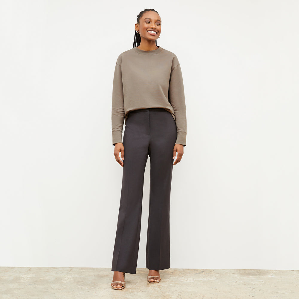 Front image of a woman wearing the Ellie Pullover - Light French Terry in Light Truffle