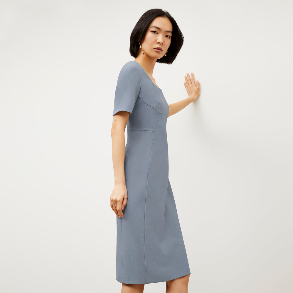Side image of a woman wearing the Noa Dress - Recycled Wondertex in Steel Blue