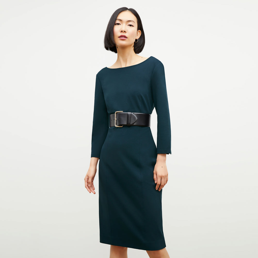 Front image of a woman wearing the Winston Dress in Deep Sea