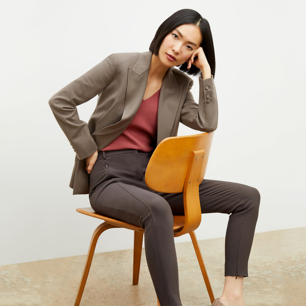 Side image of a woman wearing the Curie Pant in Dark Mink