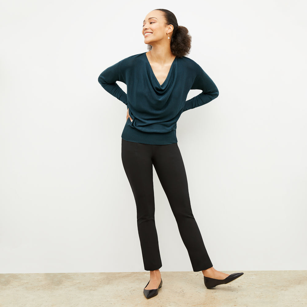 Front image of a woman wearing the Monica in Deep sea