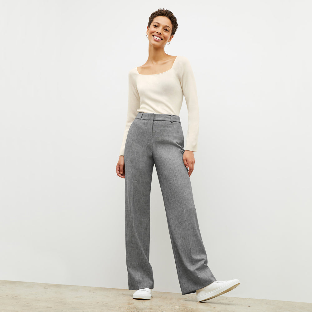 Front image of a woman wearing the Joya Top in Cream