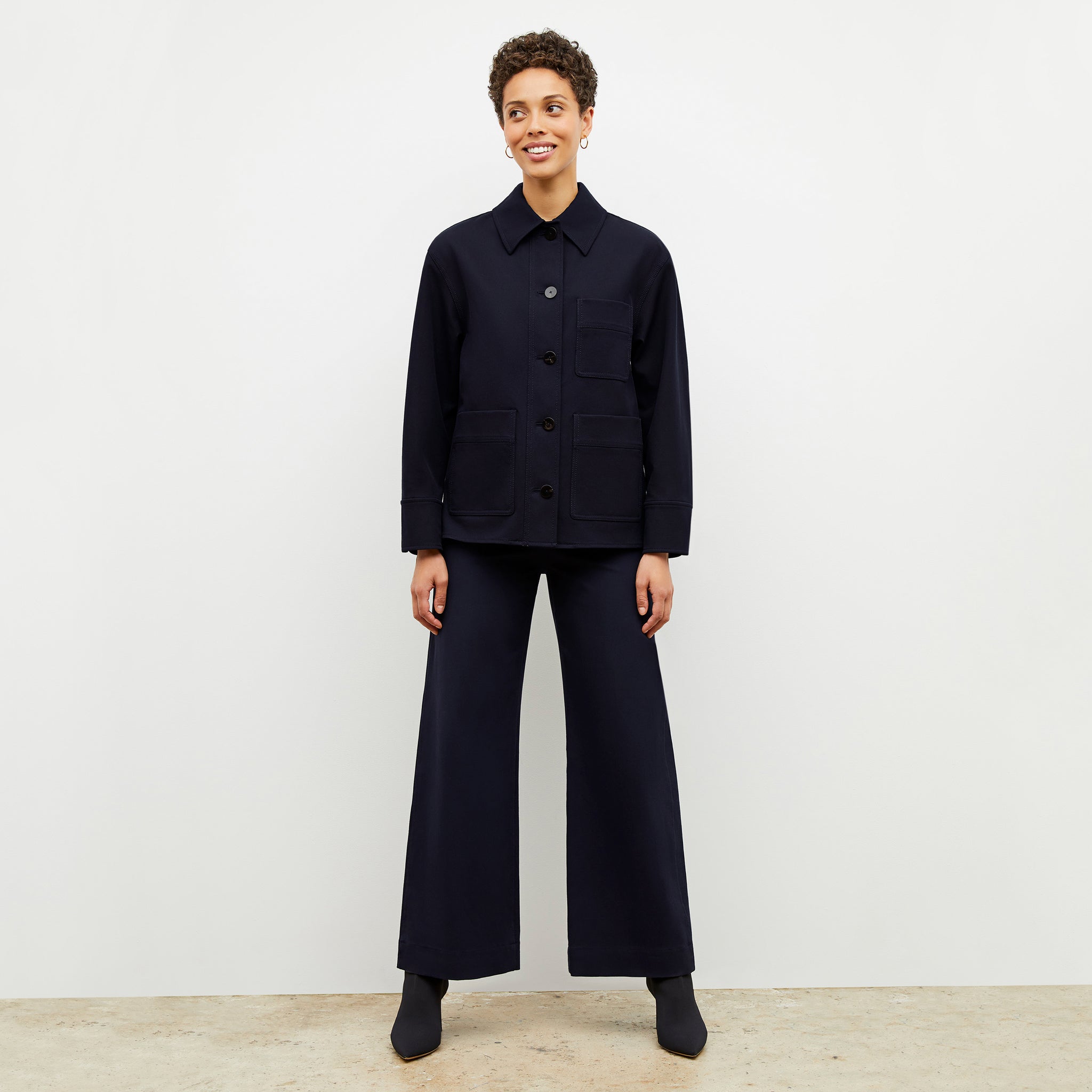 Front image of a woman wearing the steffi jacket in ink