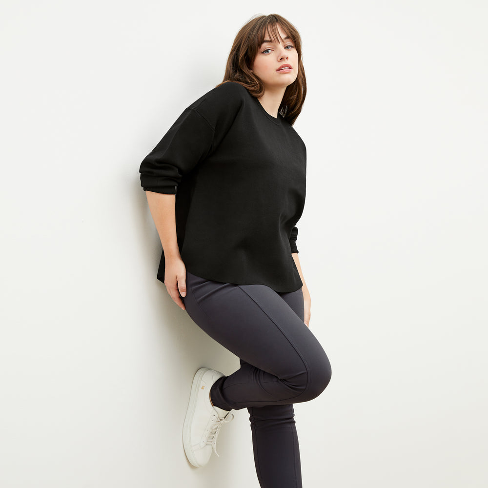 Side image of a woman wearing the Curie Pant - Everstretch in Monsoon