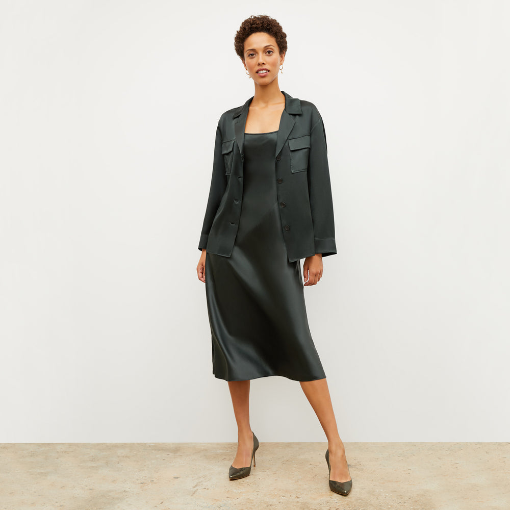 Image of a woman wearing the Alyssa Jacket in Hunter