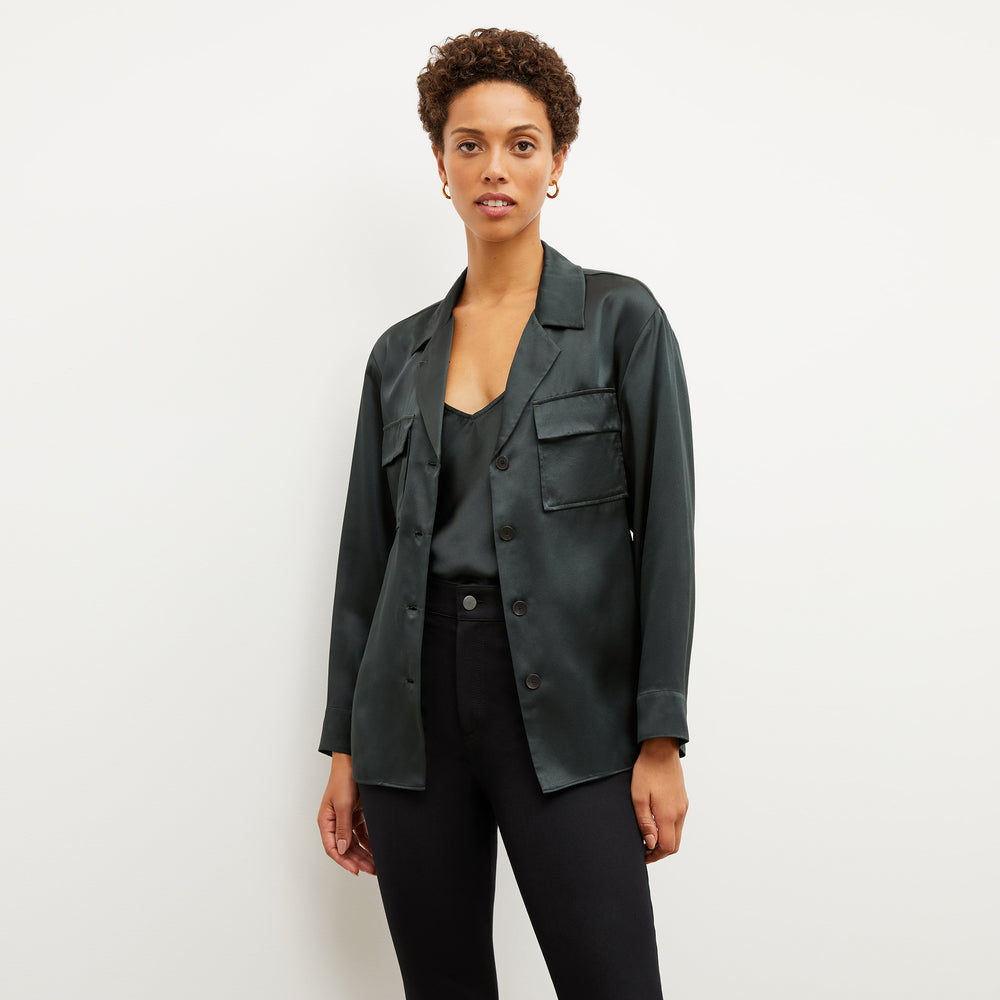 Image of a woman wearing the Alyssa Jacket in Hunter