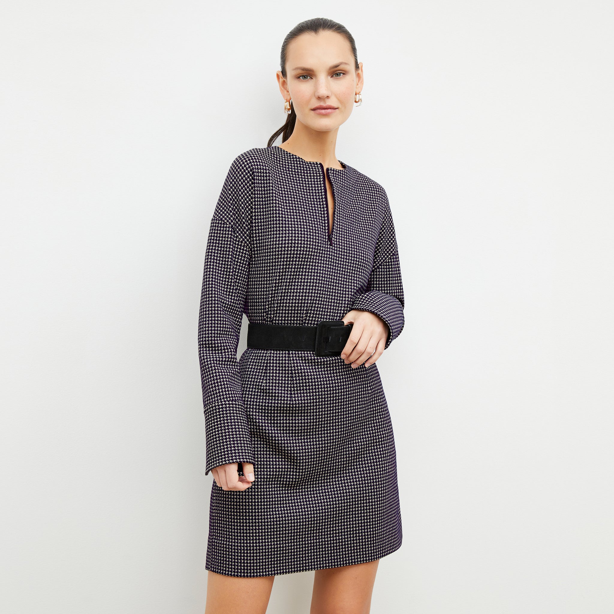 Front image of a woman wearing the tully top in black and white