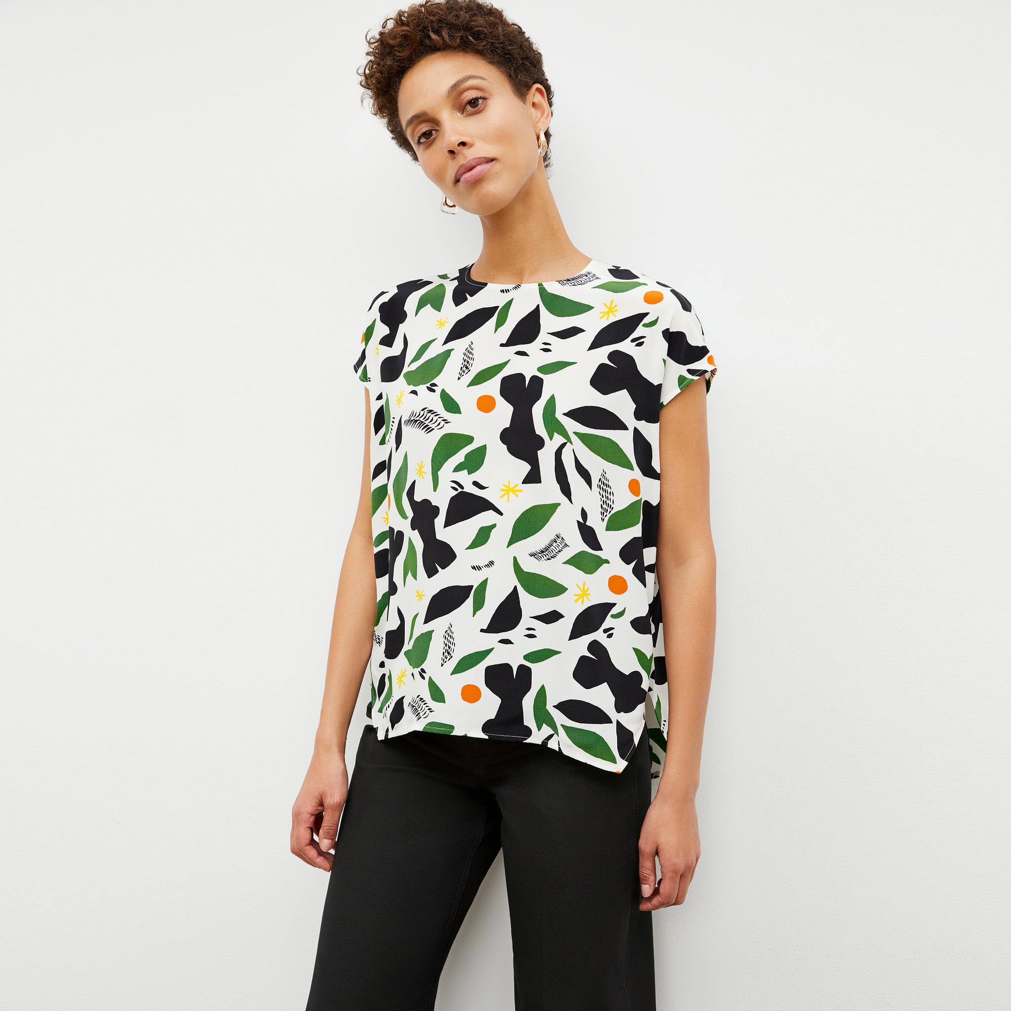 Front image of a woman wearing the didion top on icon print 