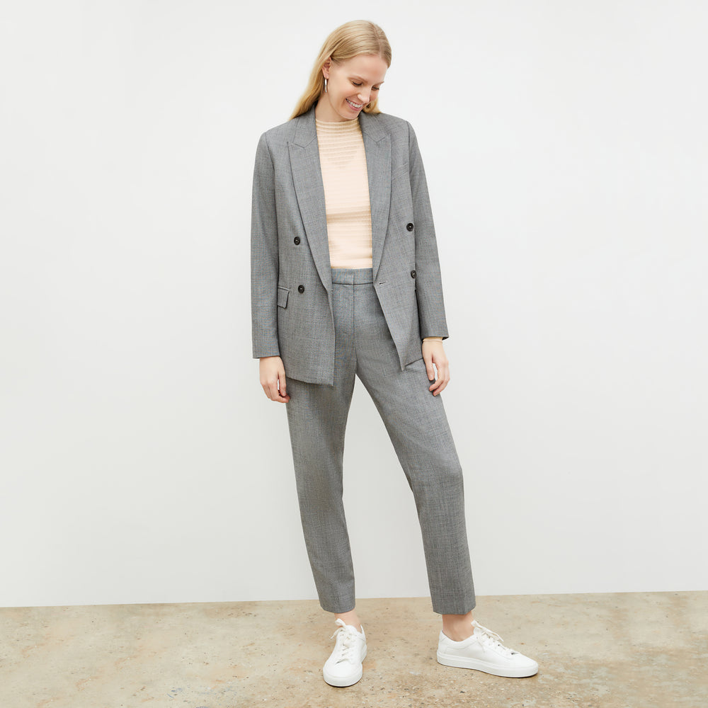 Front image of a woman wearing the Brodie Top in Meringue