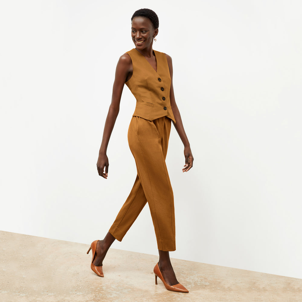 Front image of a woman wearing the Shane Pant in Acorn