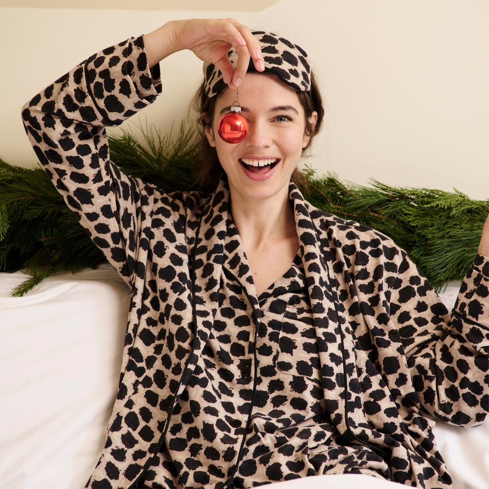 Front image of a woman wearing the Petite Plume x M.M. Long Sleeve Short Set in Sahara Print