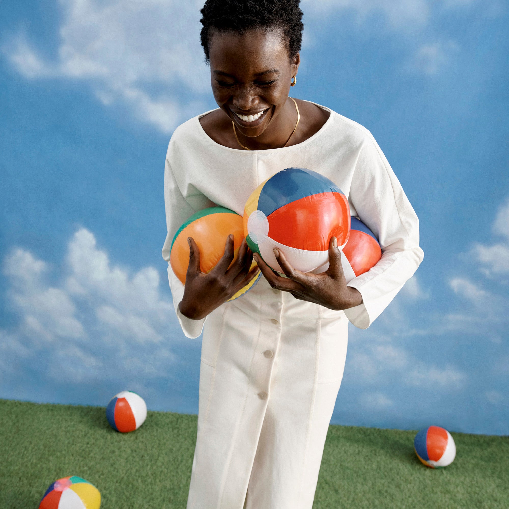 Image of a woman wearing the Wren top in Ivory
