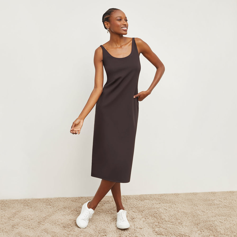 Front image of a woman standing wearing the Elsa Dress—Light Scuba in Haze